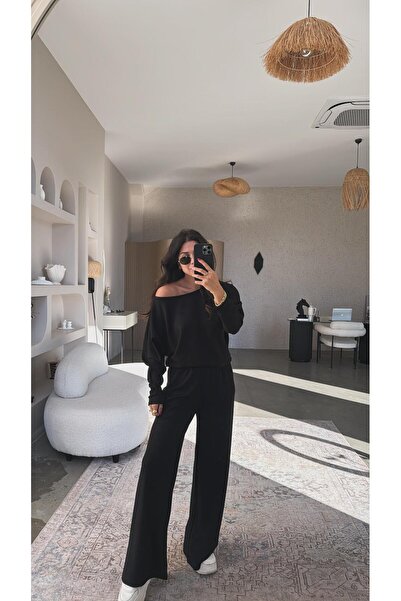 Buket Teke بدلة سوداء بياقة قارب من قماش المودال