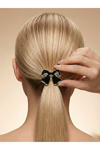 Candy مشبك مطاطي ملون من نوڤيريا آش فاين بتصميم فيونكة مينا