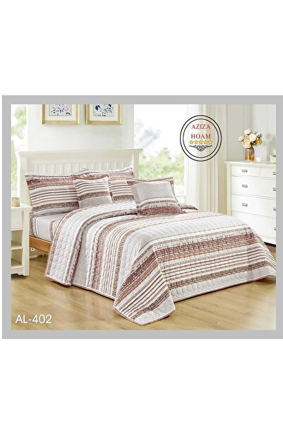 FABRIC A 6-piece double-size comforter set in brown and white with an attract...