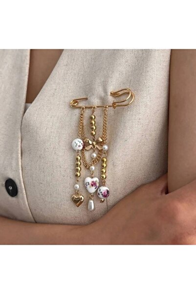 Choice بروش أنيق من السيراميك بلون ذهبي من علامة إنجيمارك، مزين بخرز على شكل ...