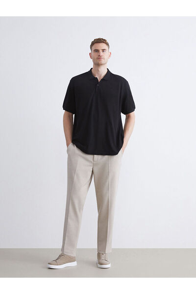 LC Waikiki بنطلون تشينو رجالي ضيق باللون البيج من MG TREND