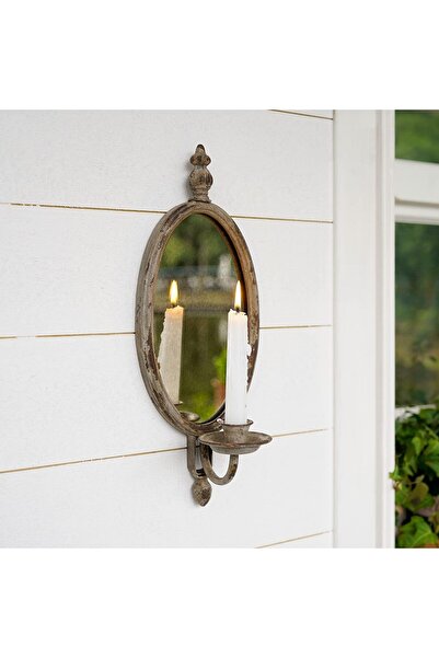 The Bros حامل شموع جداري معدني عتيق من تصميم سوفي، مزود بمرآة بيضاوية باهتة.