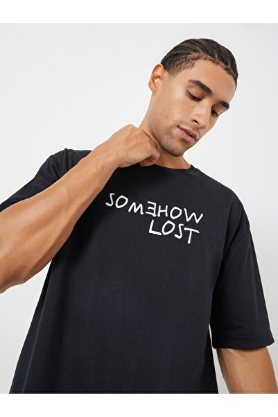 Styli Men Black Oversized Slogan Print T-Shirt