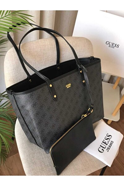 Generic A large black shopping bag with a sophisticated printed pattern. The perfect design for the stylish working woman, it accommodates all your needs.