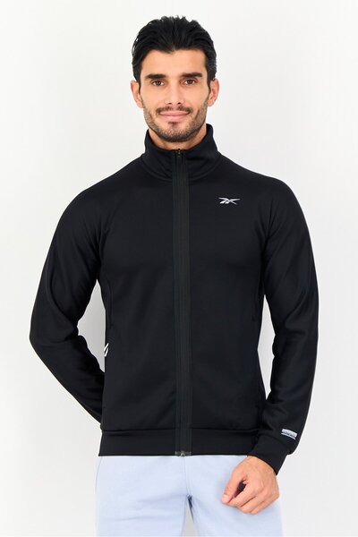 Reebok جاكيت تدريب رجالي بأكمام طويلة وشعار ماركة ملابس رياضية، أسود