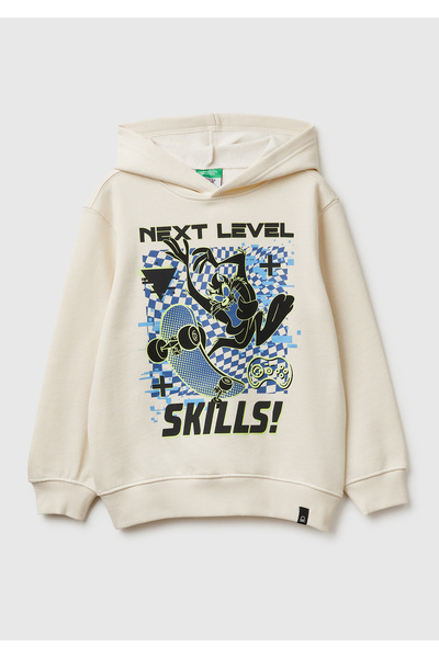 United Colors of Benetton سويت شيرت كريم تازمانيا مطبوع ريبانال بغطاء رأس قصة...