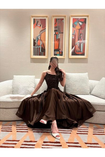 Star dresses فستان نسائي بني ترتر