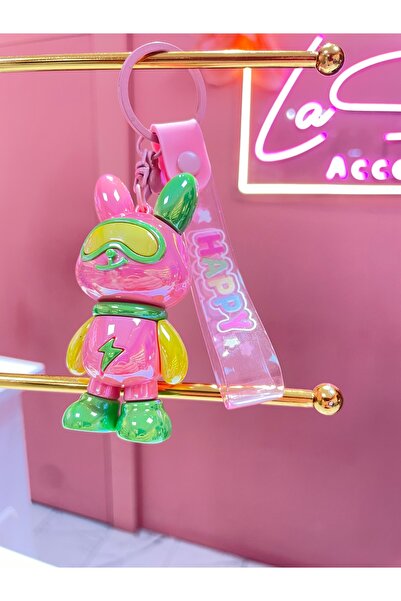 La She Accessories سلسلة مفاتيح باللون الوردي مع شخصية البطل الخارق