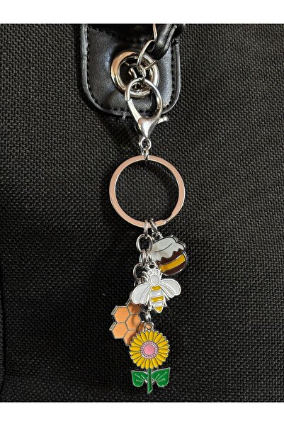 bijoux uniques حقيبة مزخرفة وسلسلة مفاتيح