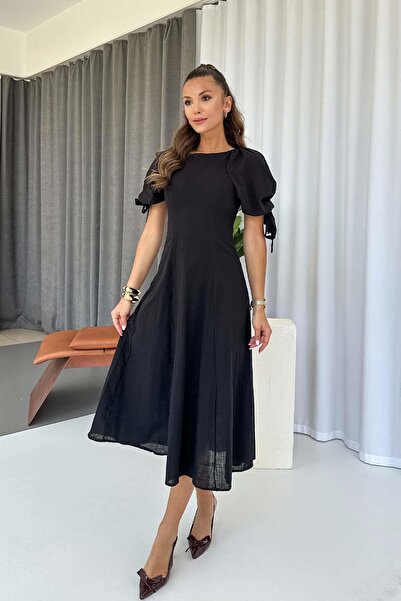 Mine Tan Butik فستان ماكسي أسود - تصميم بأكمام بالون وظهر متقاطع