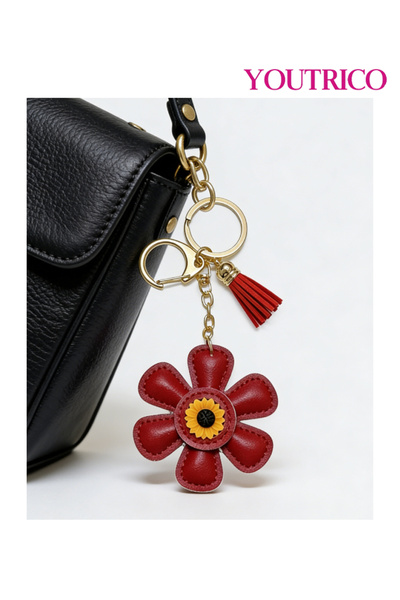 Youtrico قطعة واحدة من حقيبة جلدية مصنوعة يدويًا على شكل عباد الشمس وسلسلة مفاتيح على شكل كرتون لطيف