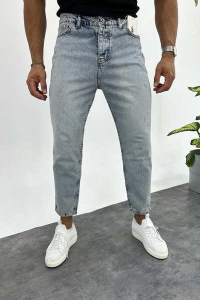 MADZEYMODA بنطال جينز Boyfriend ممزق قليلاً باللون الأزرق الفاتح