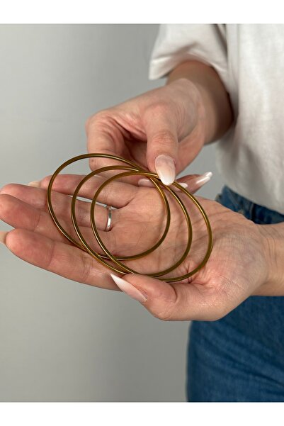 Gold Trio Charm Bileklik – Nazar Güneş, Kanat ve Taşlı Yıldız Seti