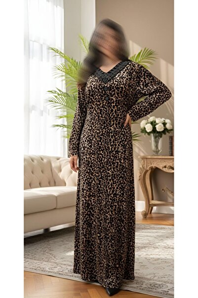 ISHRAQAT AL-AMAL A velvet dress with a leopard print, embroidered neckline, and a back tie.