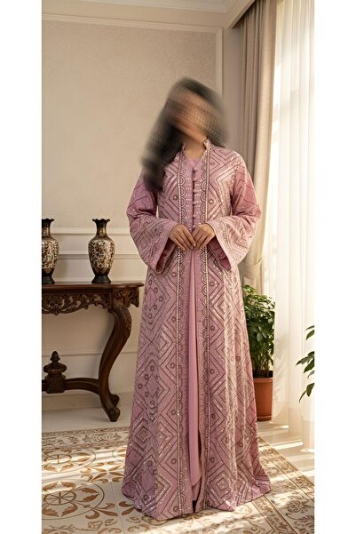 ISHRAQAT AL-AMAL A jalabiya fully embroidered with shiny threads