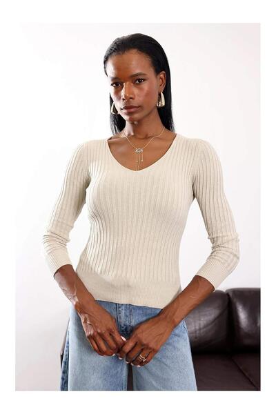 Coral قماش مجدّل سترة برقبة على شكل حرف V 185 حجر