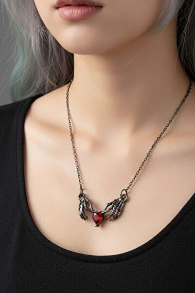 Karakedi قلادة على شكل قلب من الفضة على شكل هيكل عظمي