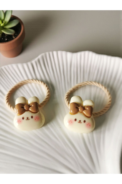 Halley Concept Cream-colored rabbit elastic hair tie for kids