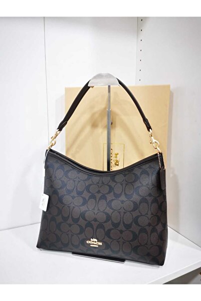 Generic A large shoulder bag with a luxurious dark pattern, a spacious and practical design, and metallic accents that give it a sophisticated look.