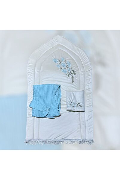 FABRIC A white prayer rug with a sky-blue set and delicate embroidery adds a ...