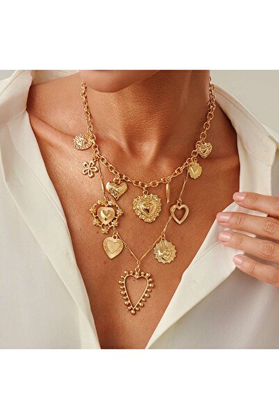 Choice قلادة تشوكر ذهبية اللون من إنجيمارك، بتصميم بانك مجوف على شكل قلب وزهر...