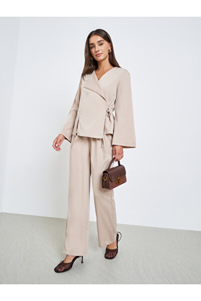 Styli Women Beige Solid Wrap Top and Pants Co-Ords