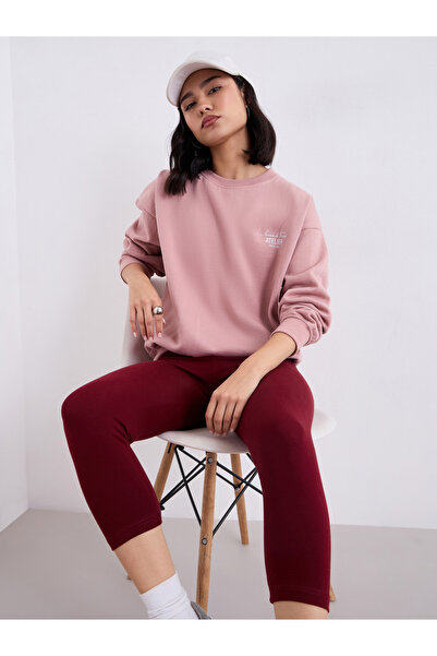 Styli بنطلون ليجنز كابري نسائي بلون عنابي