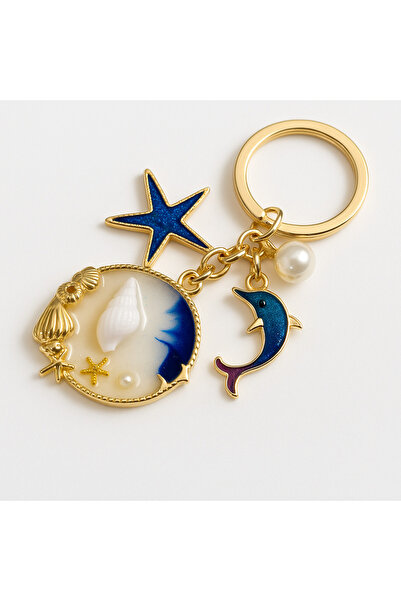 FDY سلسلة مفاتيح ذات طابع بحري ذهبية اللون - تصميم أنيق مع تفاصيل الدلافين ون...