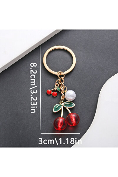 Hilosh Gold Color Keychain and Bag Accessory with Cherry Figured Pearl Detail