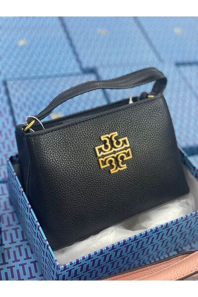 Generic A classic black handbag in pebbled leather with an iconic gold logo. Small in size, but it makes a big difference to your style.