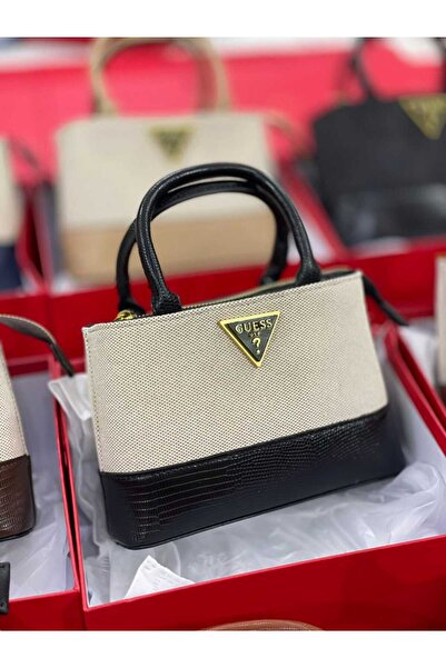 Generic A mini white bag with a black crocodile-embossed leather base. The perfect addition to complete your sophisticated evening look.