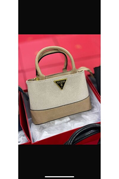 Generic A mini canvas bag in a warm beige color with a dark beige base. A soft touch for your relaxed daytime looks.