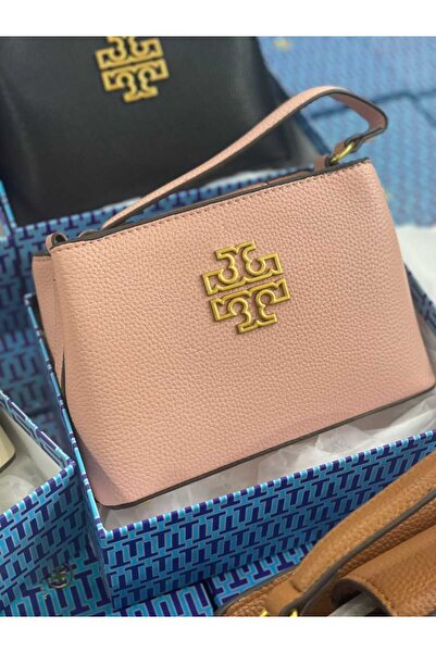 Generic A small shoulder bag in a soft pink hue and pebbled leather. Its feminine design adds a touch of elegance and charm to your modern look.