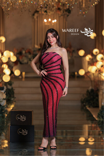 WAREEF FASHION فستان سهرة طويل بتطريز لامع وخطوط انسيابية فاخرة
