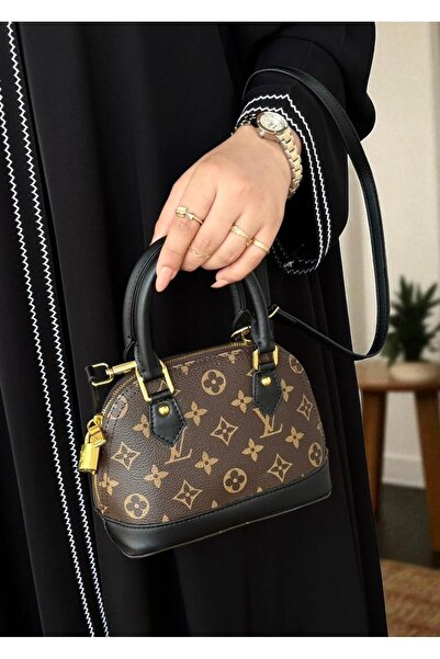 Generic A small bag with a short double handle and leather embossed in the famous brown and black pattern.