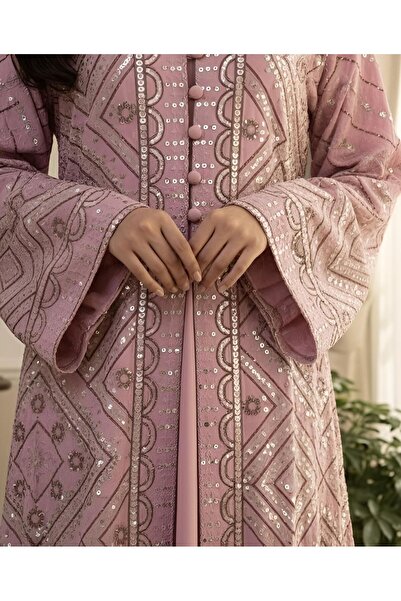 ISHRAQAT AL-AMAL A jalabiya fully embroidered with shiny threads