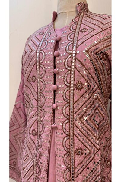 ISHRAQAT AL-AMAL A jalabiya fully embroidered with shiny threads