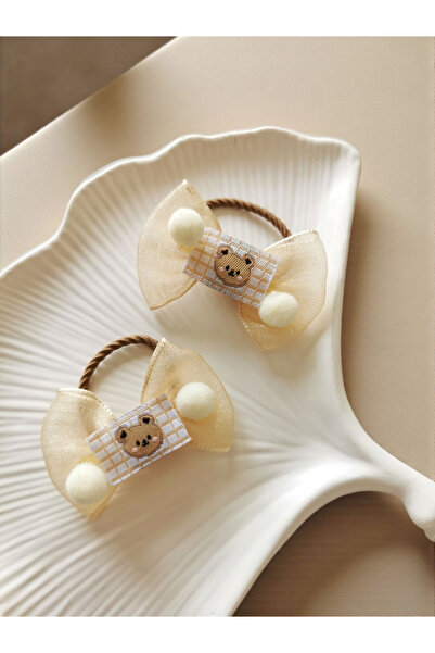 Halley Concept Brown elastic child hair tie with bow