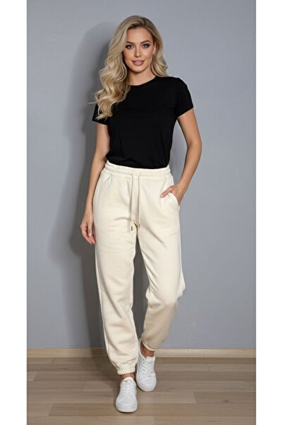 diğerr1 بنطلون رياضي كريمي اللون