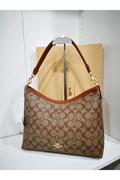 Generic A shoulder bag with a classic pattern and light brown color; a spacious and practical design suitable for work and everyday outings.