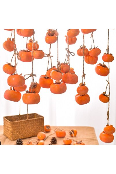 Choice فاكهة الكاكي البرتقالية المحاكية مع فرع فاكهة الصقيع المعلقة على الحائ...