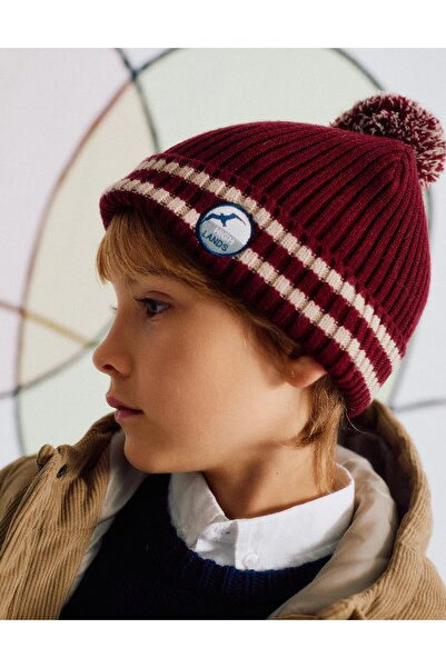 Ziddy قبعة حياكة مضلعة مع بوم بوم للأولاد، أحمر غامق