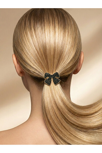 Candy مشبك مطاطي ملون من نوڤيريا آش فاين بتصميم فيونكة مينا