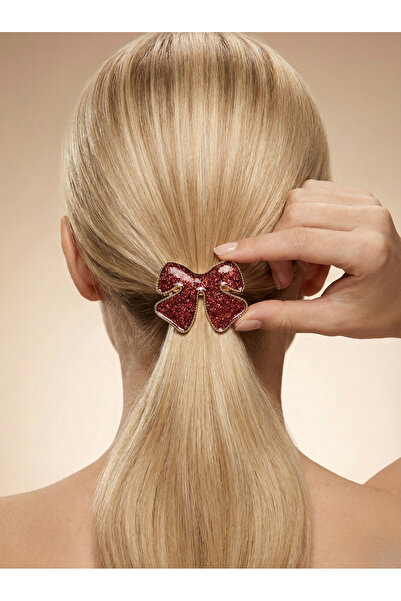 Candy مشبك مطاطي ملون من نوڤيريا آش فاين بتصميم فيونكة مينا