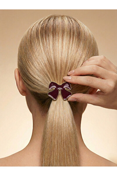 Candy مشبك مطاطي ملون من نوڤيريا آش فاين بتصميم فيونكة مينا