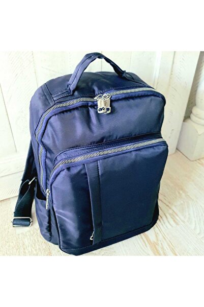 Produse.Top Rucsac albastru din material textil impermeabil cu buzunar antifurt cu fermoar si suport pentru tro