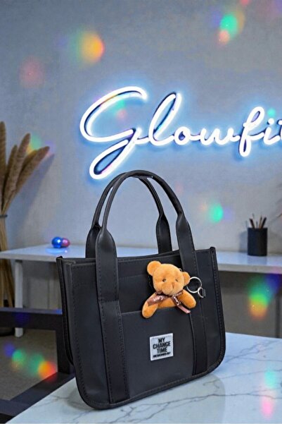 Glowfit Shine Your Shape Kadın Siyah Su Geçirmez Buzzy Kumaş Omuz Çantası – Fermuarlı, Dış Cepli, Uzun Askılı (21x24x13 cm)