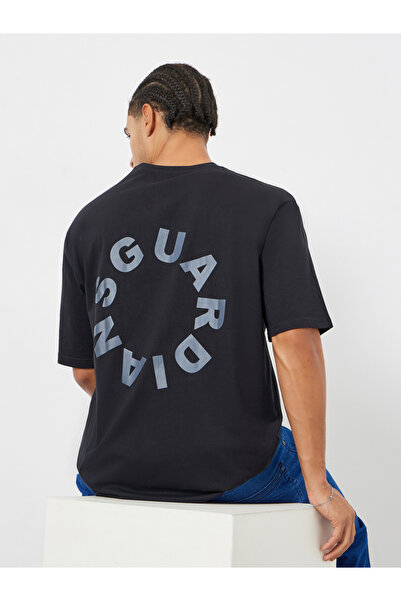 Styli Men Black Slogan Print Oversized T-Shirt