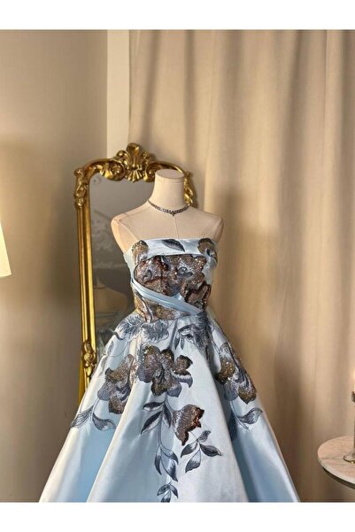 vanus fashion 6161- فستان سماوي فاخر بنقوش زهرية لامعة وتصميم ناعم