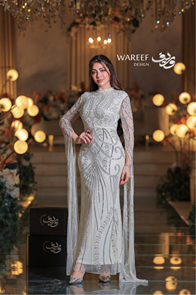 WAREEF FASHION فستان سهرة سكري فاخر مطرز بالفضي بتصميم كلاسيكي راق وأكمام شفافة منسدلة